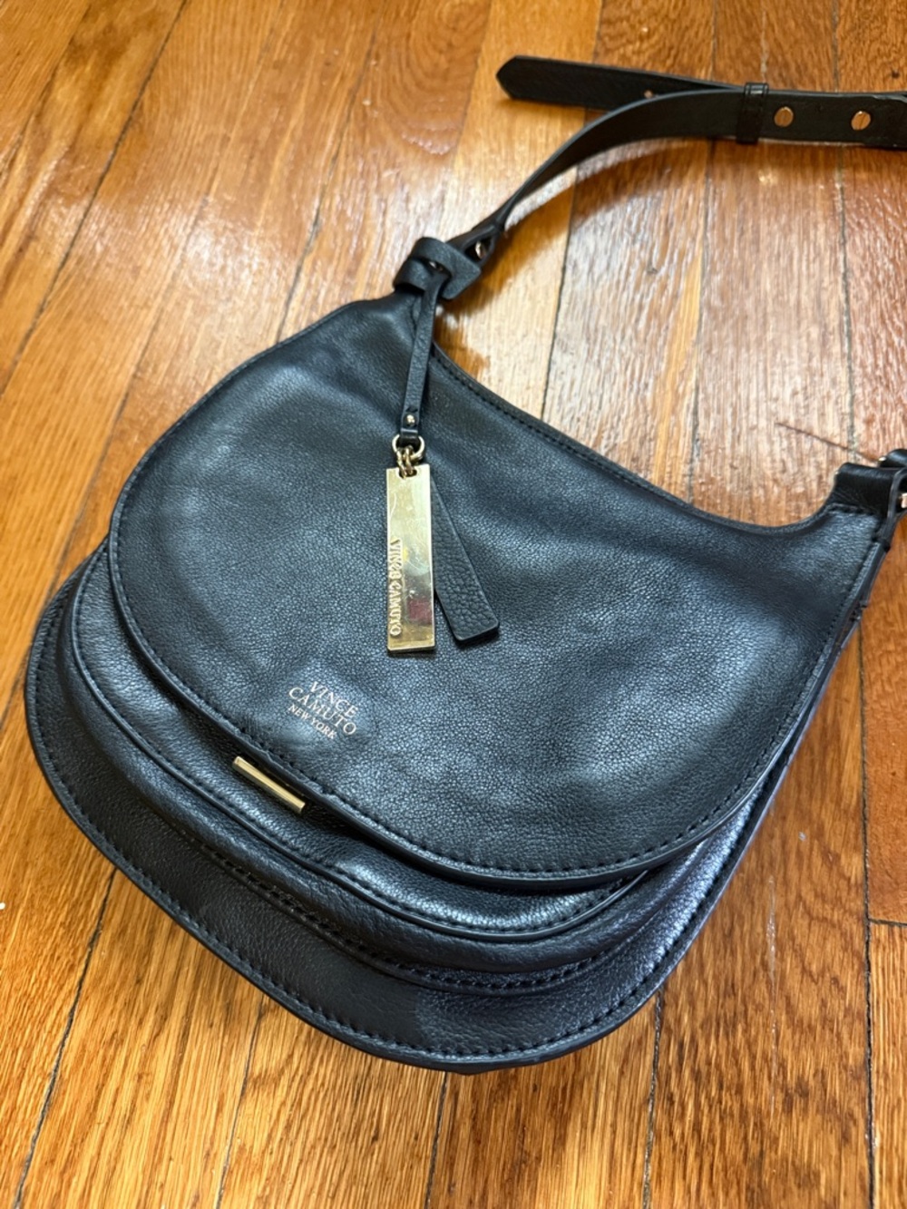 Vince Camuto  Black Leather Crossbody Saddle Bag with locking gold hardware